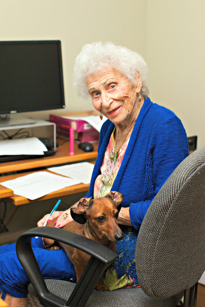 Eleanore volunteering with Sophie, her dog